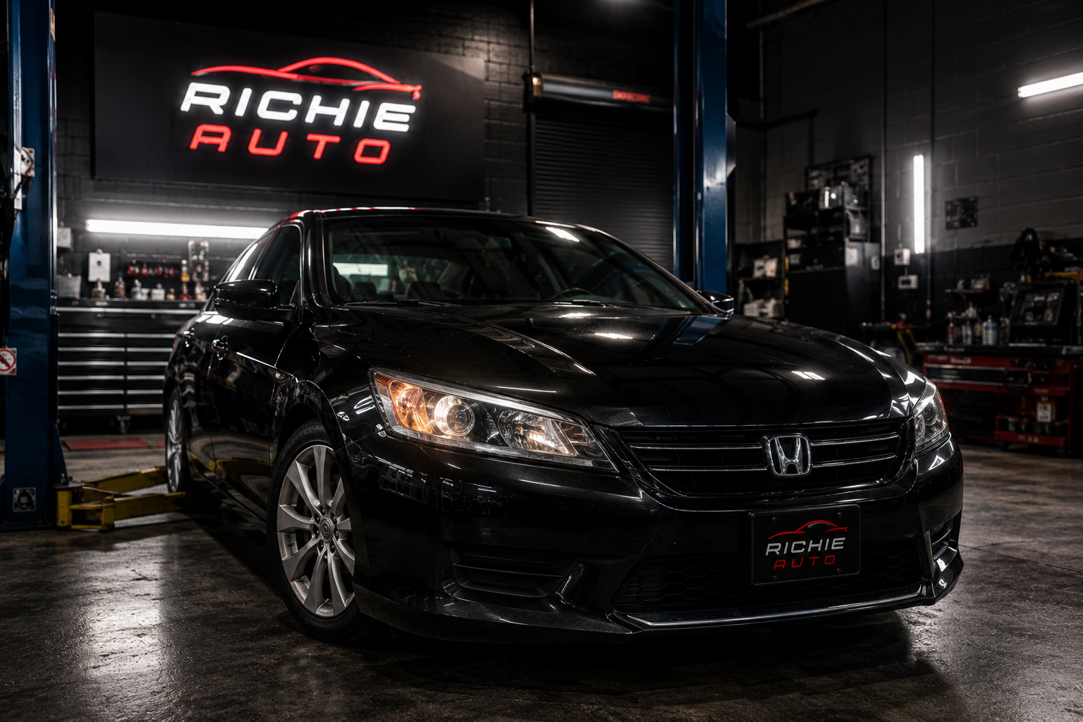 Honda Accord under the Richie Auto sign